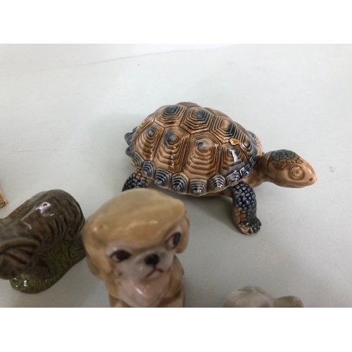 148 - Vintage Wade collection of whimsies, cartoon characters, and animals