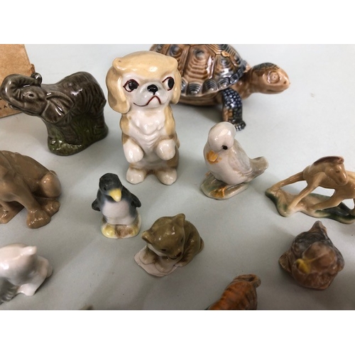 148 - Vintage Wade collection of whimsies, cartoon characters, and animals