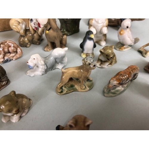 148 - Vintage Wade collection of whimsies, cartoon characters, and animals