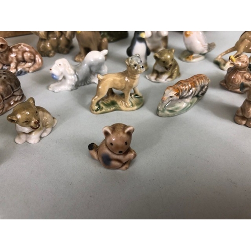 148 - Vintage Wade collection of whimsies, cartoon characters, and animals