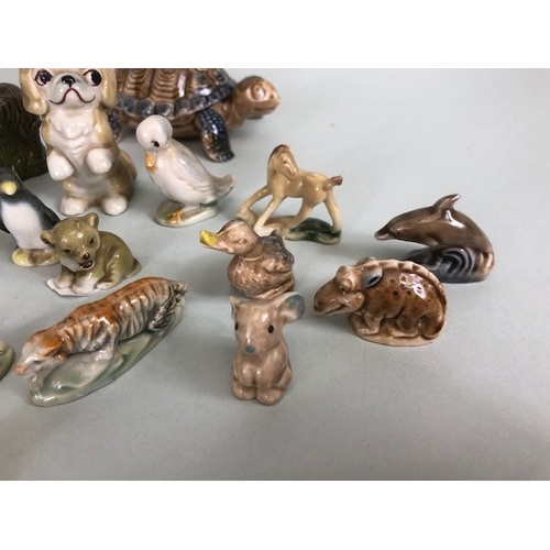 148 - Vintage Wade collection of whimsies, cartoon characters, and animals