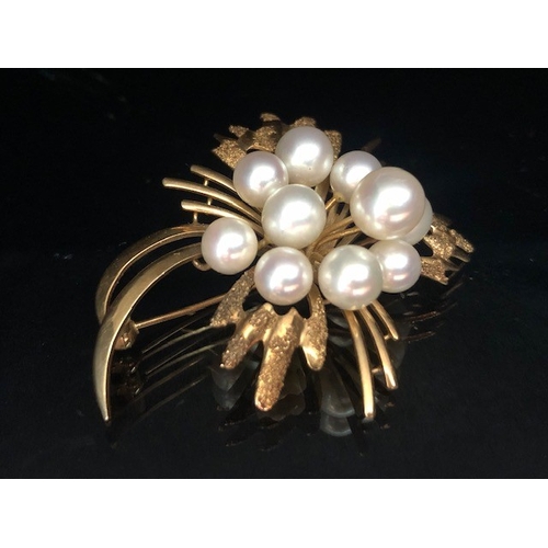 17 - 14ct Gold and pearl floral spray brooch with ten raised pearls and texture to some gold petals appro... 