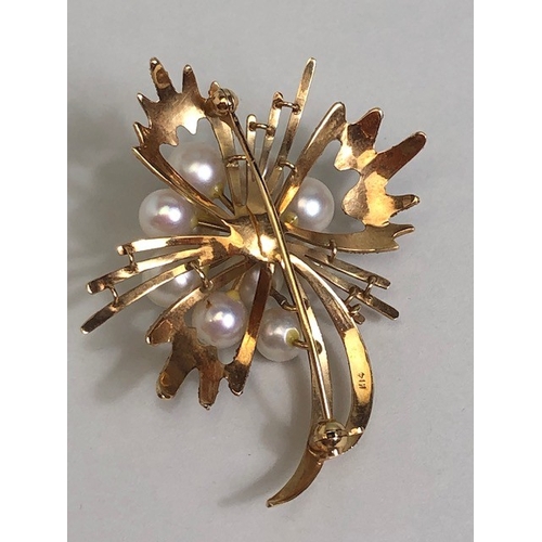17 - 14ct Gold and pearl floral spray brooch with ten raised pearls and texture to some gold petals appro... 