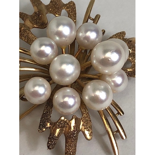 17 - 14ct Gold and pearl floral spray brooch with ten raised pearls and texture to some gold petals appro... 