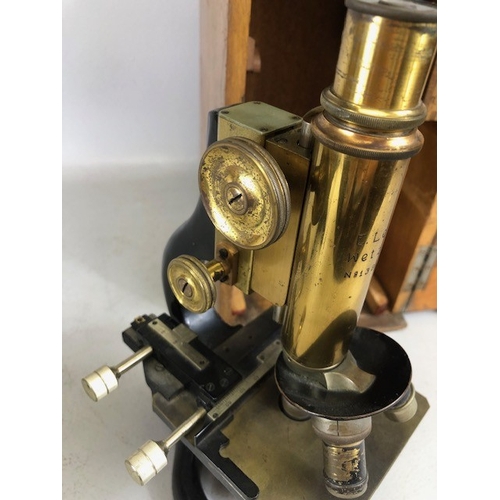 189 - Antique and vintage Microscopes, E Leitz Wetzlar Microscope 138678, in its wooden case, and a Becks ... 