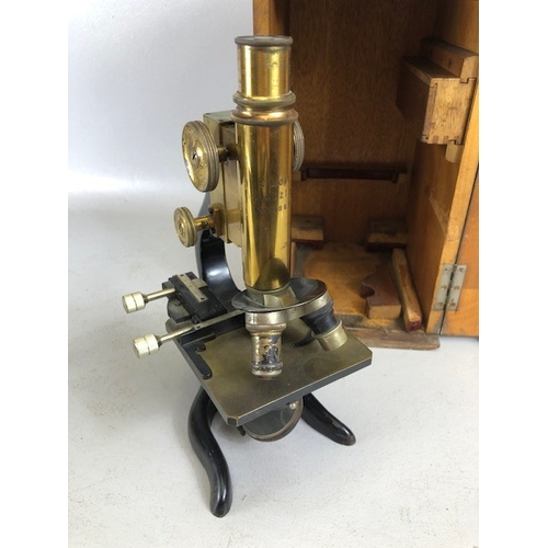 189 - Antique and vintage Microscopes, E Leitz Wetzlar Microscope 138678, in its wooden case, and a Becks ... 