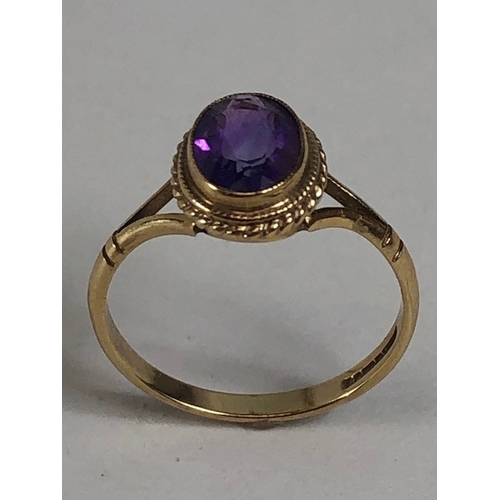 32 - Vintage 9ct Gold ring set with a purple Amethyst Oval cut and faceted approx size L