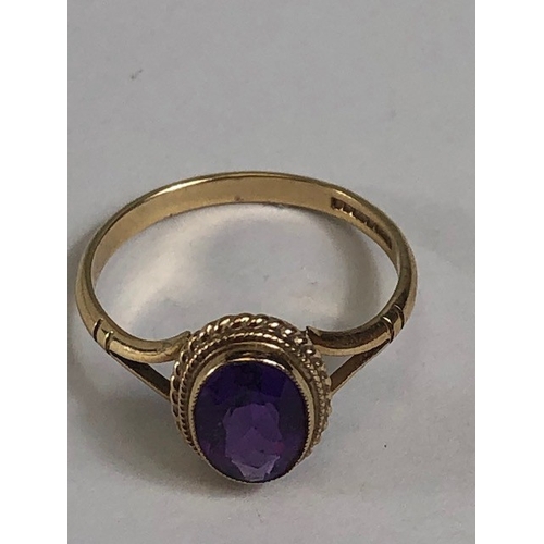 32 - Vintage 9ct Gold ring set with a purple Amethyst Oval cut and faceted approx size L