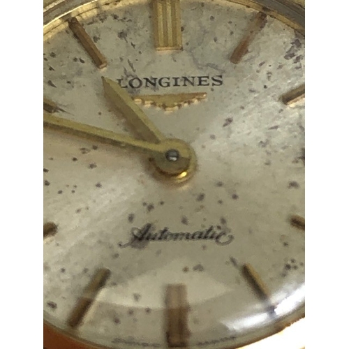 42 - Longines 18ct Gold cased wristwatch automatic with champagne dial (A/F) approx 19mm in diameter and ... 