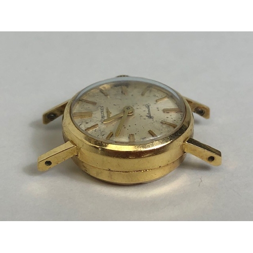42 - Longines 18ct Gold cased wristwatch automatic with champagne dial (A/F) approx 19mm in diameter and ... 