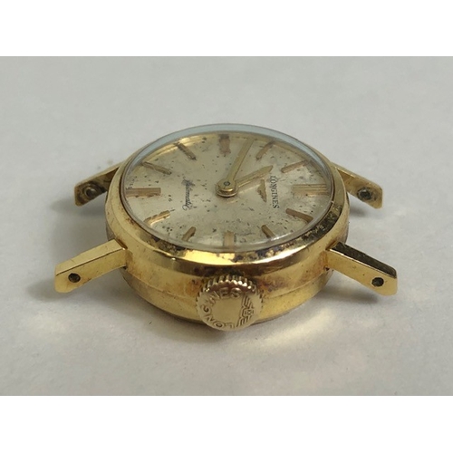 42 - Longines 18ct Gold cased wristwatch automatic with champagne dial (A/F) approx 19mm in diameter and ... 