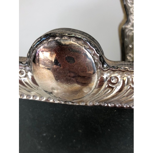 82 - Antique and vintage silver, two photo frames mounted in hallmarked silver, one with floral decoratio... 