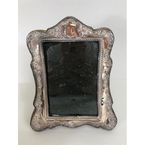 82 - Antique and vintage silver, two photo frames mounted in hallmarked silver, one with floral decoratio... 
