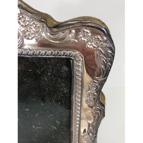 82 - Antique and vintage silver, two photo frames mounted in hallmarked silver, one with floral decoratio... 