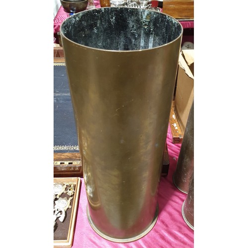 19 - A brass shell casing dated 1961, height 16.5