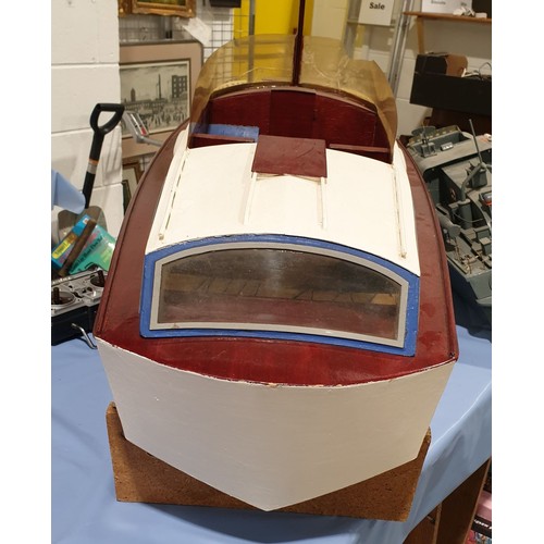 4 - A remote control boat with a controller, length 49