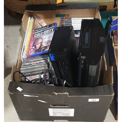 123 - A Playstation 2 and a Playstation 3 and games and accessories.