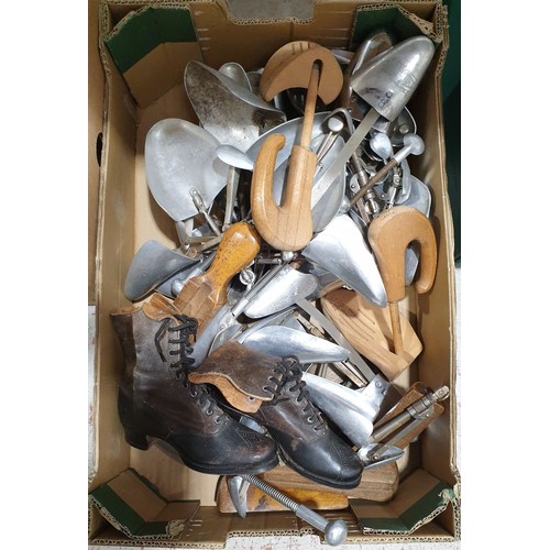 54 - A box including shoe trees. No in house shipping. Please arrange collection or a shipper.