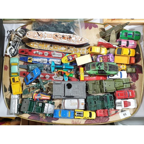 65 - A selection of toy vehicles.