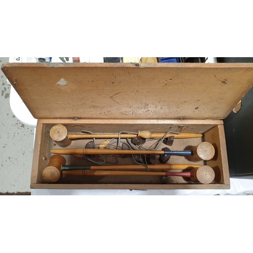 71 - A vintage table croquet set.