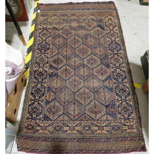 481 - A vintage eastern hand knotted rug, 52