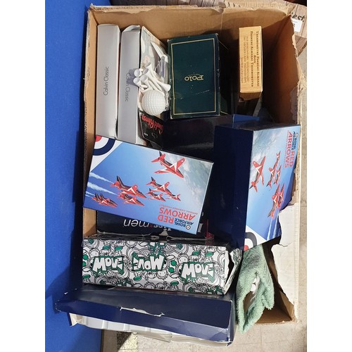 404 - A box of new in packet men's items.