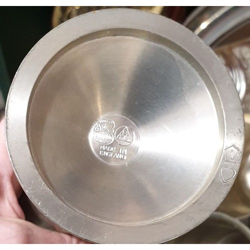 17 - A box of metal ware including six quality goblets.