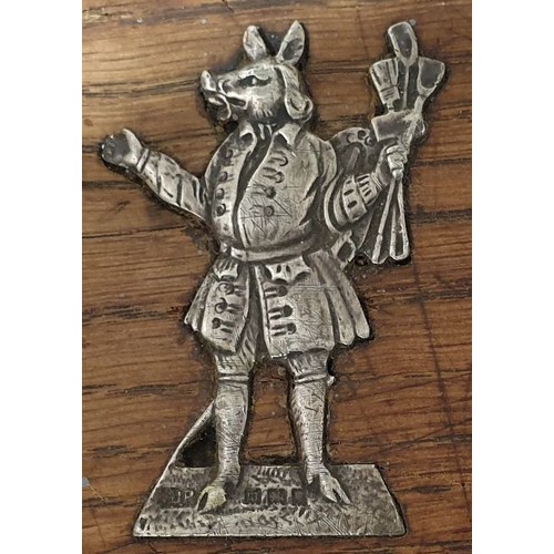 25 - An oak chopping board with silver hallmarked boar figure motif together with a carving knife and for... 