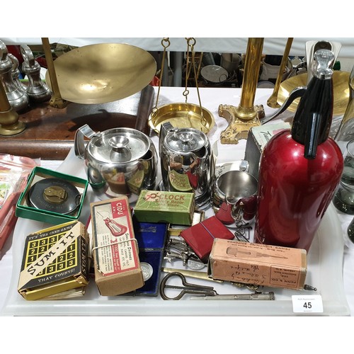 45 - A tray of assorted including a retro soda syphon, Old Hall tea ware and a surveyor's measuring tape.... 