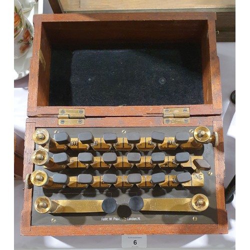 6 - An antique mahogany cased Wheatstone bridge, maker Robert W. Paul, London, width 10