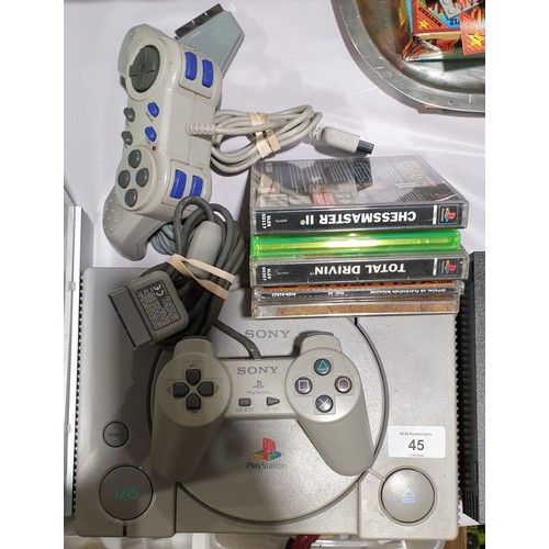 45 - A Playstation 1 with games and two controllers.

UK shipping only, £14.