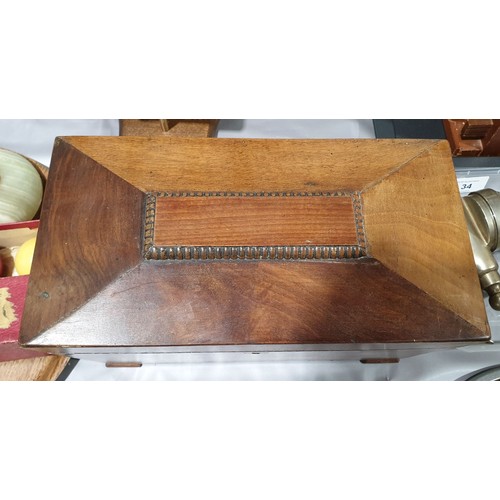 32 - A 19th century sarcophagus shaped tea caddy, width 11