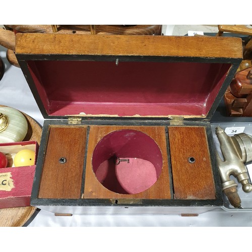 32 - A 19th century sarcophagus shaped tea caddy, width 11