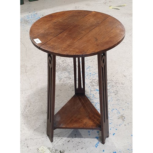 181 - An early 20th century oak Arts and Crafts occasional table, height 26.5