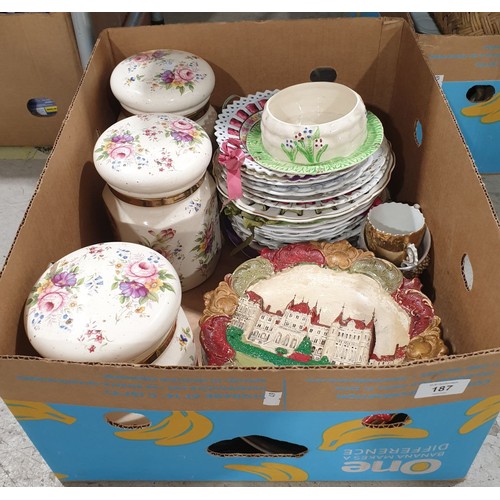 187 - A box of ceramics including three canisters. No shipping. Arrange collection or your own packer and ... 