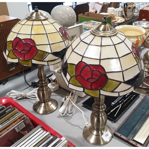 192 - Two plastic Tiffany style lamps. No shipping. Arrange collection or your own packer and shipper plea... 