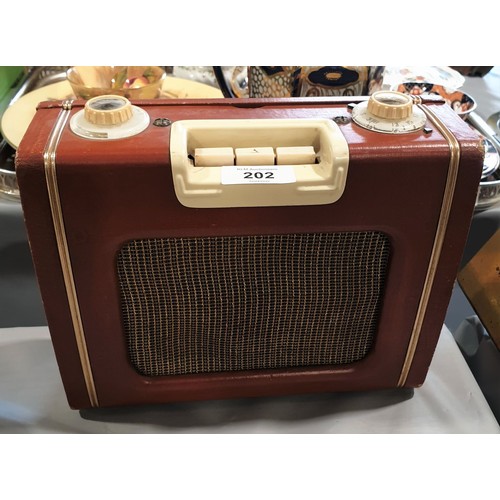 202 - A vintage radio.

UK shipping £14.