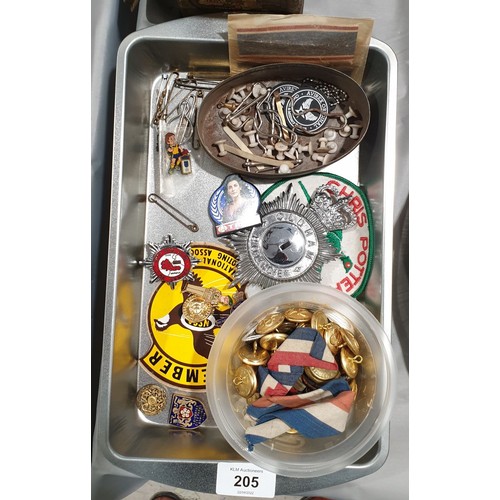 205 - A tray of collectables including a West Midlands Fire Service badge.

UK shipping £14.