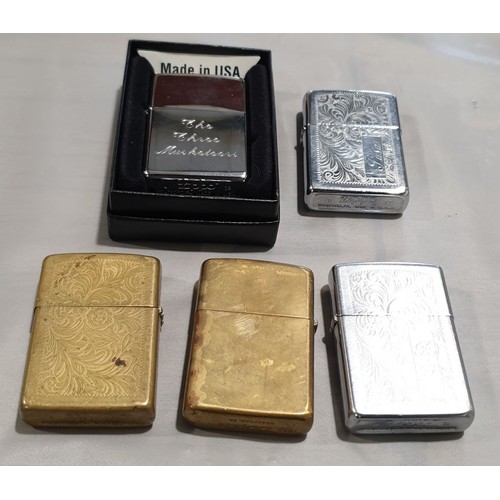 211 - Five Zippo lighters.

UK shipping £14.