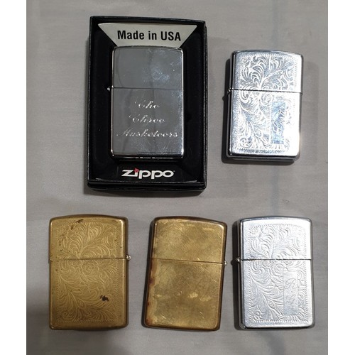 211 - Five Zippo lighters.

UK shipping £14.
