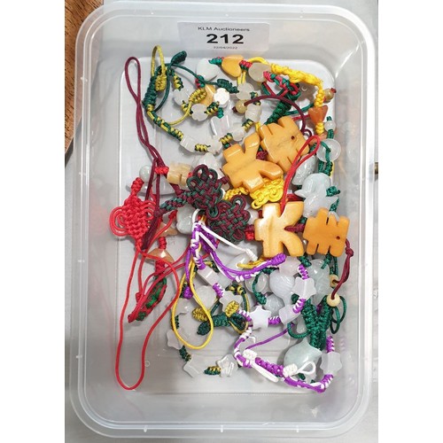 212 - Fifteen jade bead pendants and bracelets.

UK shipping £14.