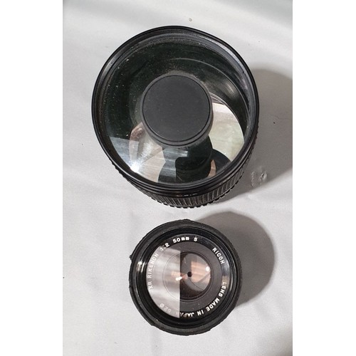 552 - A Centon Mirror lens together with a Ricoh XR Rikenon 50mm lens.

UK shipping £14.
