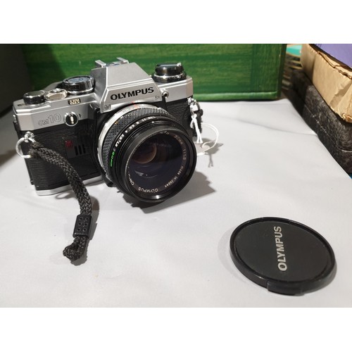 544 - An Olympus OM10 camera with an Olympus 50mm lens.

UK shipping £14.