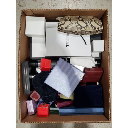 25 - A box of jewellery boxes including designer.

UK shipping £14.