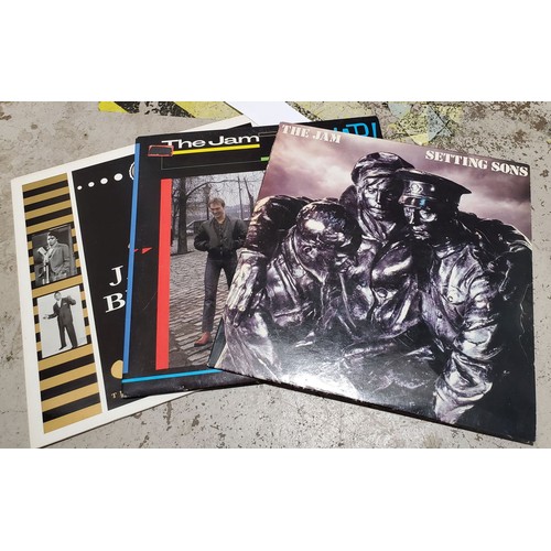 34 - The Jam LPs and nine singles together with a James Brown LP.

UK shipping £14.