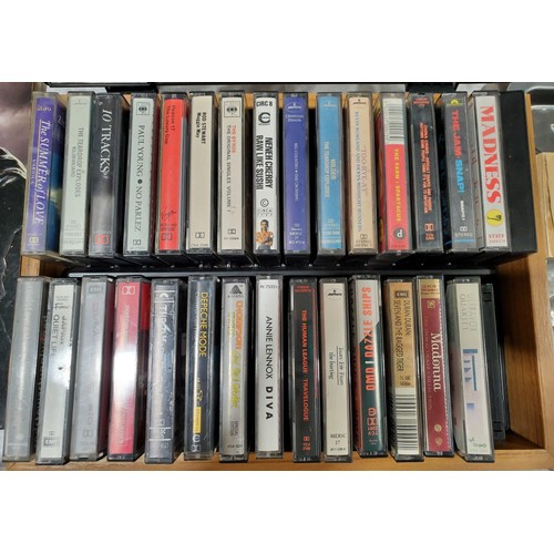 35 - A vintage cassette case and cassettes mainly 1980s.

UK shipping £14.