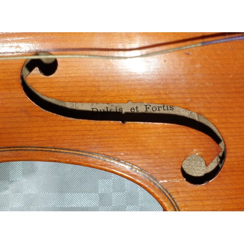20 - A cased Dulcis et Fortis violin and bow, the back 13