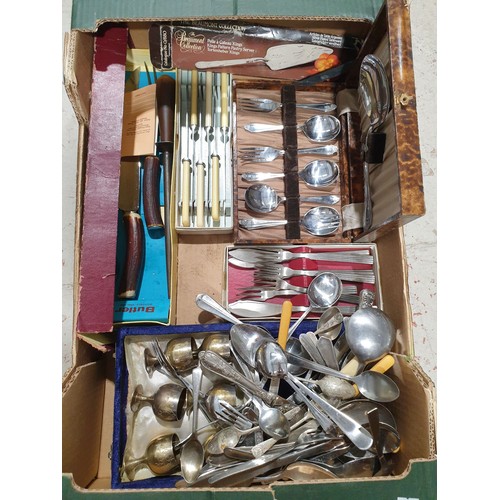 54 - A box including flatware. UK shipping £14.