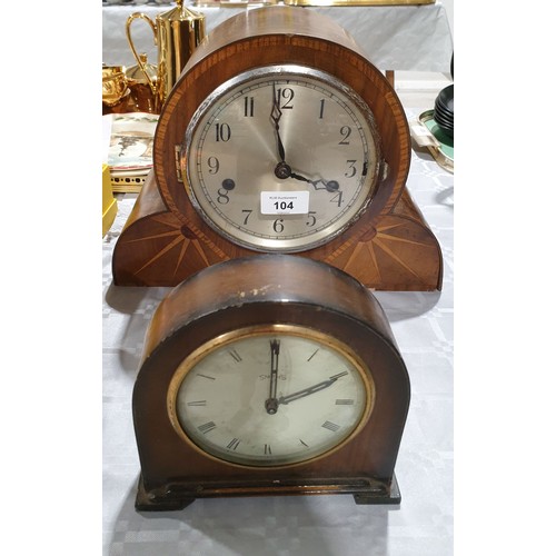 104 - An Art Deco inlaid mantel clock with a presentation plaque dated 1935 and one other clock. No shippi... 