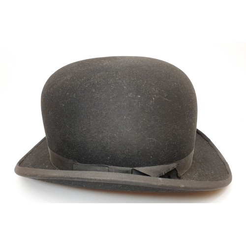 115 - A vintage bowler hat 